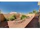 View of the backyard landscaping with privacy walls at 7920 Aviano Pines Ave, Las Vegas, NV 89129