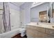 Neutral bathroom featuring a shower-tub combination and single sink vanity at 7920 Aviano Pines Ave, Las Vegas, NV 89129
