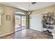 Dining area with tile floor, sliding glass doors to the backyard at 7920 Aviano Pines Ave, Las Vegas, NV 89129