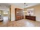 Bright dining area featuring tile flooring and traditional furnishings at 7920 Aviano Pines Ave, Las Vegas, NV 89129