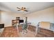 Large office with wood floors, shelving, and computer setup at 7920 Aviano Pines Ave, Las Vegas, NV 89129