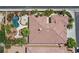 Aerial view of a single-Gathering home showcasing a private backyard pool and lush landscaping at 7986 Merlewood Ave, Las Vegas, NV 89117