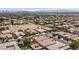 Beautifully landscaped home with a private pool and lush greenery in a desirable neighborhood at 7986 Merlewood Ave, Las Vegas, NV 89117