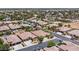 Aerial view of a home featuring mature landscaping and a convenient three-car garage at 7986 Merlewood Ave, Las Vegas, NV 89117