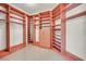 Well-organized walk-in closet offers built-in shelving and ample storage space at 7986 Merlewood Ave, Las Vegas, NV 89117