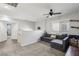 Spacious upstairs loft area, perfect for relaxing or entertaining, with comfortable sofa at 914 Appaloosa Hills Ave, North Las Vegas, NV 89081