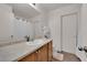 Bathroom featuring a large mirror and a spacious vanity at 9141 Careful Canvas Ave, Las Vegas, NV 89149