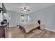 Large bedroom featuring a ceiling fan and a patio at 9141 Careful Canvas Ave, Las Vegas, NV 89149