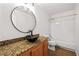 Stylish bathroom with unique vessel sink, granite countertop, and shower-tub combination at 9520 Rancho Palmas Dr, Las Vegas, NV 89117