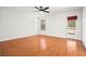 Bright bedroom with hardwood floors, ceiling fan, and a private entrance at 9520 Rancho Palmas Dr, Las Vegas, NV 89117