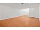 Bright living room with hardwood floors offers an open floor plan and lots of natural light at 9520 Rancho Palmas Dr, Las Vegas, NV 89117