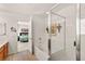 Bathroom features a shower, separate tub and doorway to the bedroom at 9522 Arrowhead Falls Ct, Las Vegas, NV 89148
