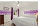 Bedroom features ceiling fan, window and closet at 9522 Arrowhead Falls Ct, Las Vegas, NV 89148