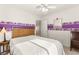 Bedroom features ceiling fan and doorway to other rooms at 9522 Arrowhead Falls Ct, Las Vegas, NV 89148