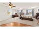 Bright bedroom with natural light, ceiling fan, study, and carpet at 9522 Arrowhead Falls Ct, Las Vegas, NV 89148