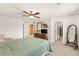 Spacious bedroom features a ceiling fan, and ensuite bath at 9522 Arrowhead Falls Ct, Las Vegas, NV 89148