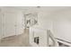Clean hallway with carpet, white walls, and multiple doors leading to different rooms at 9522 Arrowhead Falls Ct, Las Vegas, NV 89148