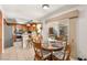 Eat-in kitchen boasting stainless steel appliances and access to a covered backyard patio at 9522 Arrowhead Falls Ct, Las Vegas, NV 89148