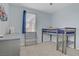 Well-lit bedroom featuring light blue walls and trim with a loft bed at 9557 Belmont Bay Ave, Las Vegas, NV 89148