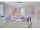 Bedroom with whimsical wall accents, a ceiling fan, and a workspace at 9557 Belmont Bay Ave, Las Vegas, NV 89148