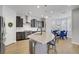 Stylish kitchen with a granite island and stainless steel appliances at 9557 Belmont Bay Ave, Las Vegas, NV 89148