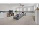 Spacious living room offers a comfortable seating area, built in storage and an area for a home office at 9557 Belmont Bay Ave, Las Vegas, NV 89148