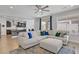 Inviting living space with comfortable seating, open floor plan and a view of the kitchen at 9557 Belmont Bay Ave, Las Vegas, NV 89148
