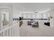 Upstairs landing offers an extra Gathering room or gathering space, with room for everyone at 9557 Belmont Bay Ave, Las Vegas, NV 89148