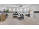 Large, comfortable living room provides ample seating with a comfortable sectional sofa and plenty of natural light at 9557 Belmont Bay Ave, Las Vegas, NV 89148