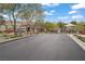 Gated community entrance with desert landscaping on a sunny day at 9557 Belmont Bay Ave, Las Vegas, NV 89148