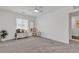 Bedroom with neutral carpet, window, chest of drawers, and a ceiling fan at 9605 Oliver Hills Ave, Las Vegas, NV 89143