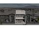 Rear exterior featuring a patio with views of the mountains at 9605 Oliver Hills Ave, Las Vegas, NV 89143
