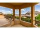 Scenic balcony view showcases the neighborhood, lush greenery and a sparkling swimming pool at 9749 Glistening Brook Ct, Las Vegas, NV 89149