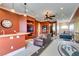 Entertaining game room featuring a wet bar, TV, and games for the whole Gathering at 9749 Glistening Brook Ct, Las Vegas, NV 89149