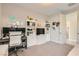 Cozy home office with a built-in bookcase, desk setup, and neutral decor at 9765 Skye Star Ave, Las Vegas, NV 89166