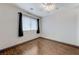 Bedroom features hardwood floors, a window, and neutral walls, offering comfortable space at 10078 Delicate Dew St, Las Vegas, NV 89183