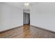 An empty bedroom showcasing beautiful floors and closet at 10078 Delicate Dew St, Las Vegas, NV 89183