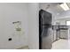 A laundry area near the kitchen at 10078 Delicate Dew St, Las Vegas, NV 89183
