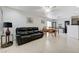 Open-concept living area featuring a spacious living room and dining area at 10078 Delicate Dew St, Las Vegas, NV 89183