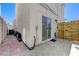 Patio with tile and access door at 10078 Delicate Dew St, Las Vegas, NV 89183