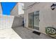Patio with tile and access door at 10078 Delicate Dew St, Las Vegas, NV 89183