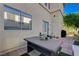Well-maintained backyard with comfortable outdoor seating, ideal for relaxing and soaking up the sunlight at 10342 Adrianna Ave, Las Vegas, NV 89129