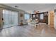 Dining area with sliding glass doors to the back patio, open to the kitchen for seamless flow at 10342 Adrianna Ave, Las Vegas, NV 89129