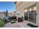 Inviting patio with stylish outdoor furniture, ideal for enjoying the fresh air, sunshine, and outdoor dining at 10342 Adrianna Ave, Las Vegas, NV 89129