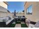 Outdoor seating with ample cushions under the sun with a coffee table in the middle at 10342 Adrianna Ave, Las Vegas, NV 89129