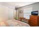 Bedroom showcasing wood-look floors and sliding door closet at 1057 Neil Armstrong Cir, Las Vegas, NV 89145