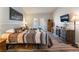 Comfortable bedroom with two beds and a dresser, ideal for guests or children at 1057 Neil Armstrong Cir, Las Vegas, NV 89145