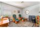 Cozy bedroom area with soft lighting and comfortable seating at 1057 Neil Armstrong Cir, Las Vegas, NV 89145