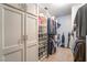 Walk-in closet with built-in shelves and ample storage space at 1057 Neil Armstrong Cir, Las Vegas, NV 89145