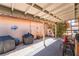 Covered patio with BBQ, outdoor decor, and gardening space at 1057 Neil Armstrong Cir, Las Vegas, NV 89145